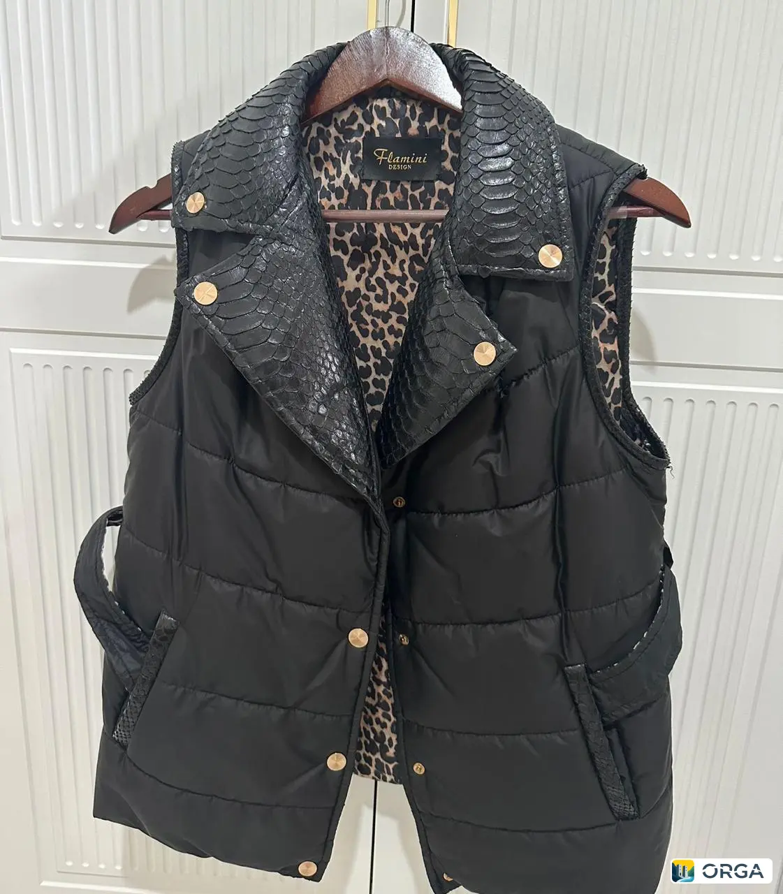 питон безрукавка